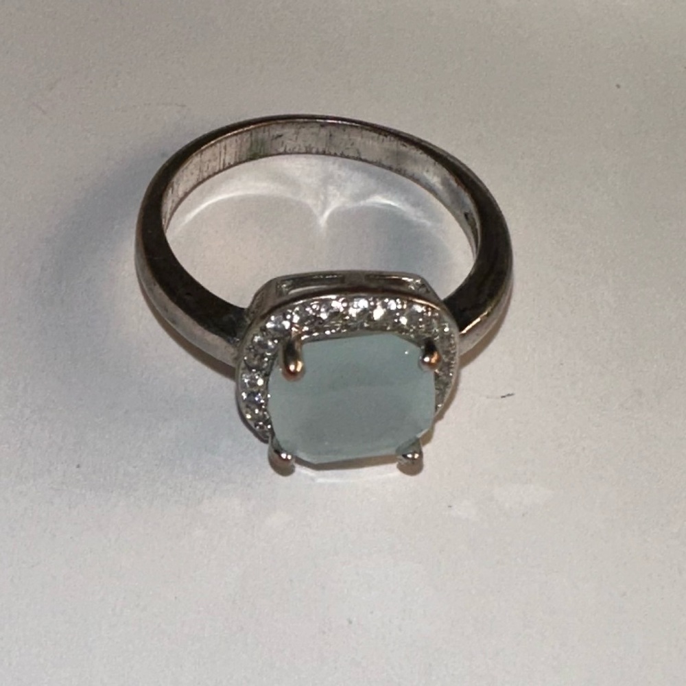 Silver Ring with Pale Mint Stone and Halo Accent